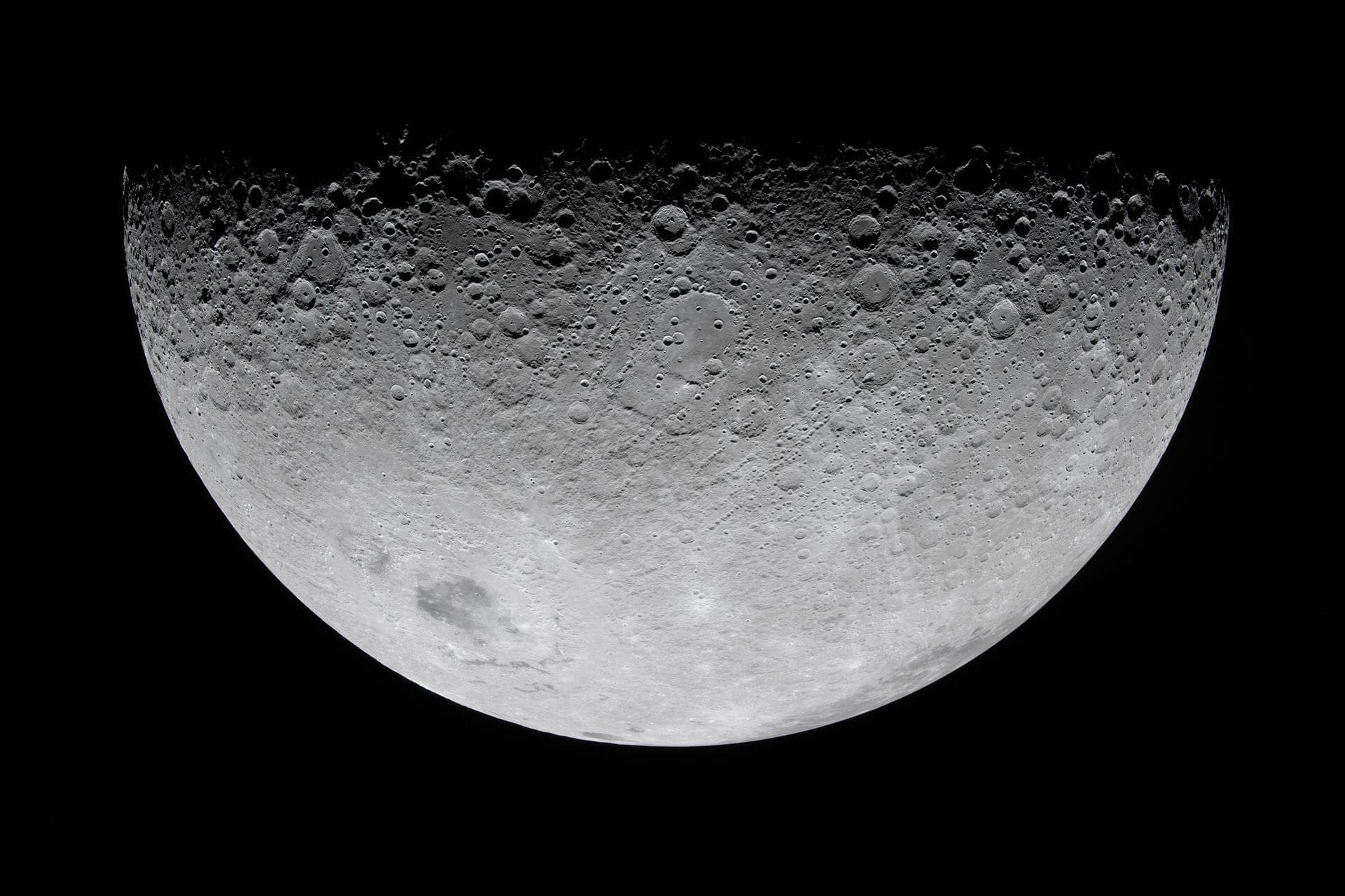 A lunar hemisphere rendered in cold chrome relief
